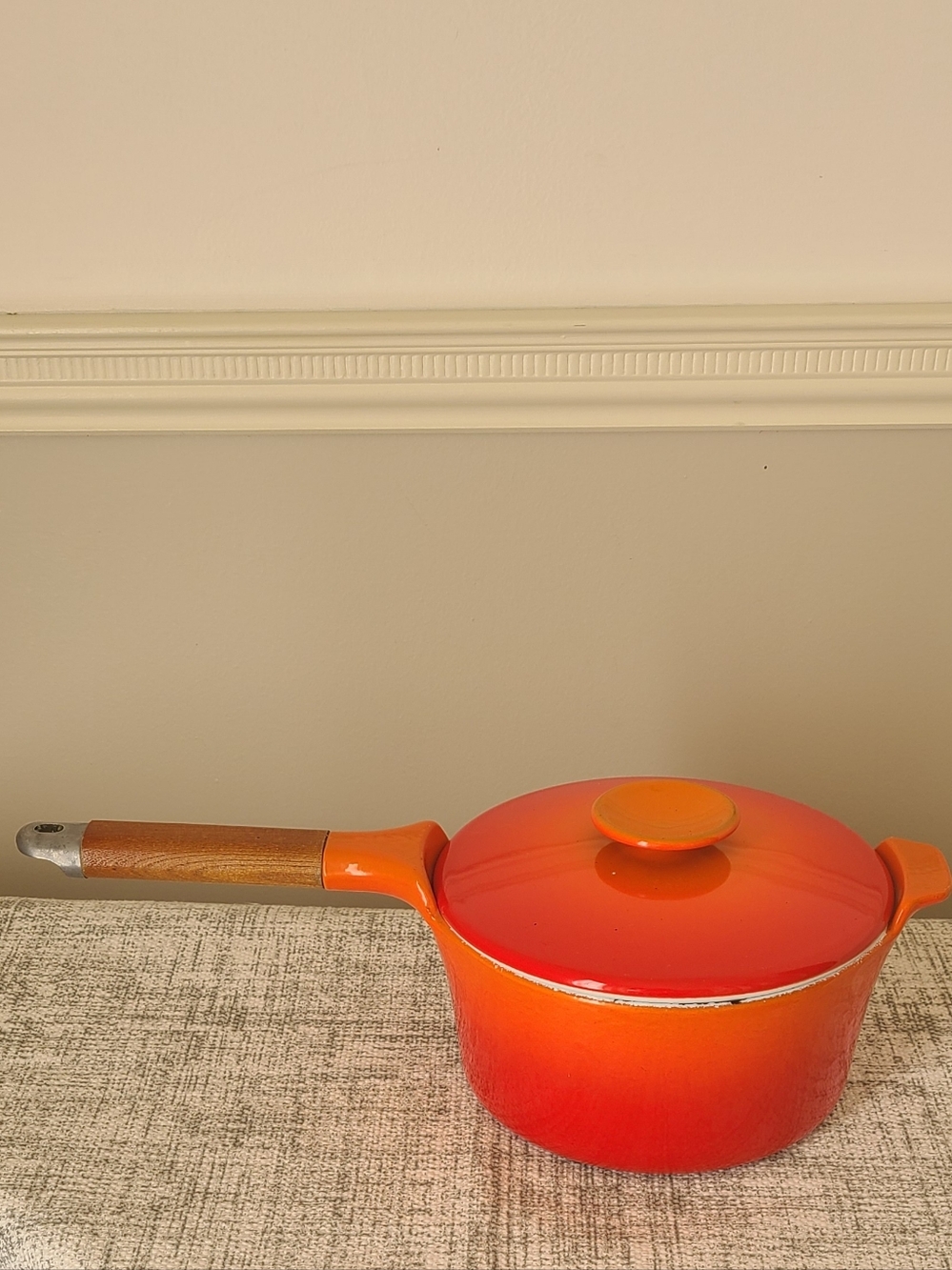 Vintage Enameled Cast Iron Saucepan with Wooden Handle Red